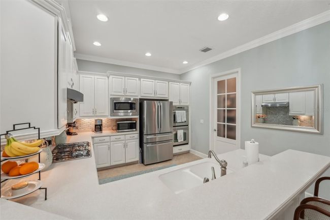 WELL APPOINTED KITCHEN WITH EXTRA COUNTER SPACE AND STORAGE! | Image 17