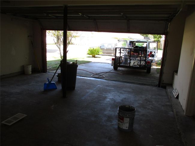double wide garage and driveway that stays pretty well shaded most of the day. | Image 19