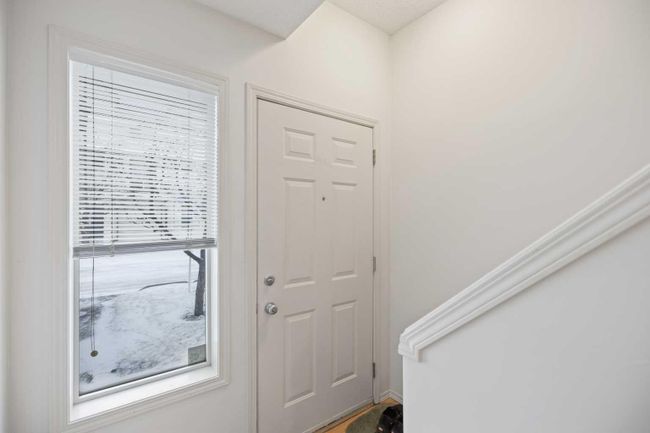 30 - 200 Hidden Hills Terrace Nw, Home with 2 bedrooms, 1 bathrooms and 2 parking in Calgary AB | Image 2