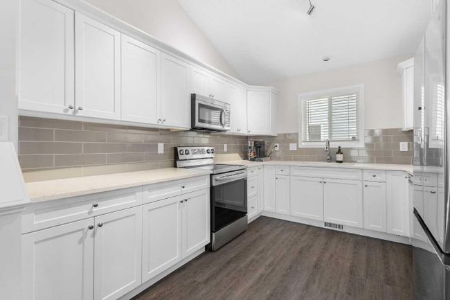 32 Arbour Crest Dr Nw, House detached with 3 bedrooms, 3 bathrooms and 2 parking in Calgary AB | Image 5