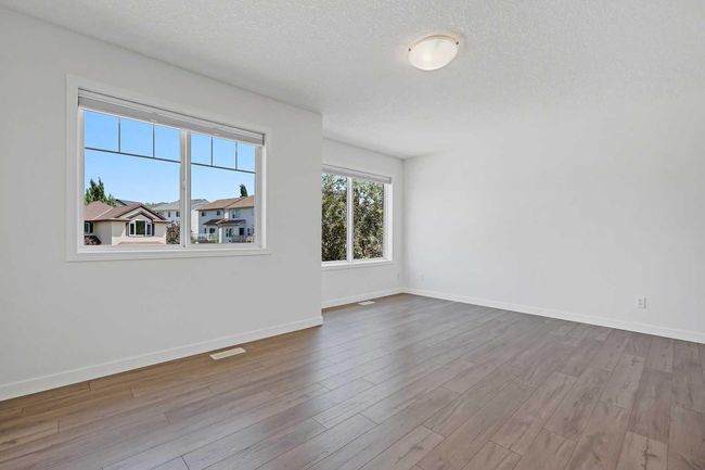 19 Rockyspring Green Nw, House other with 4 bedrooms, 4 bathrooms and 4 parking in Calgary AB | Image 19