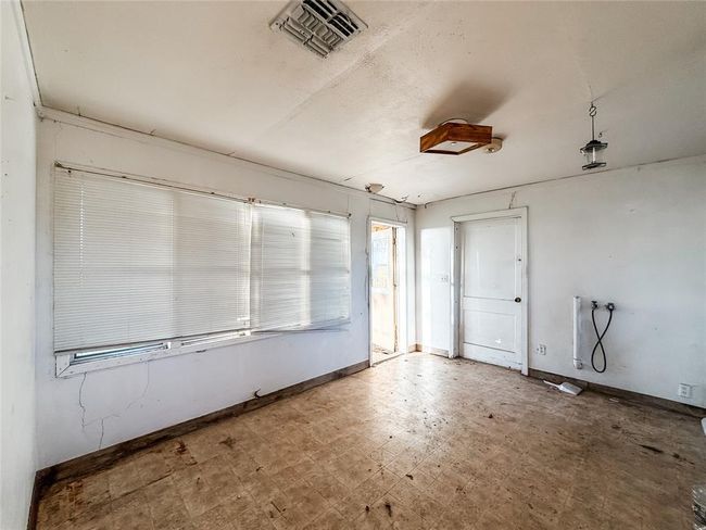 Bright and airy laundry mudroom with convenient access to the garage and outdoor spaces. | Image 15
