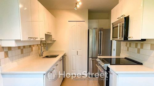 702-1566 13th Ave W, Vancouver, BC, V6J2G4 | Card Image