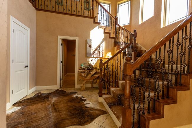 stairway in foyer | Image 6