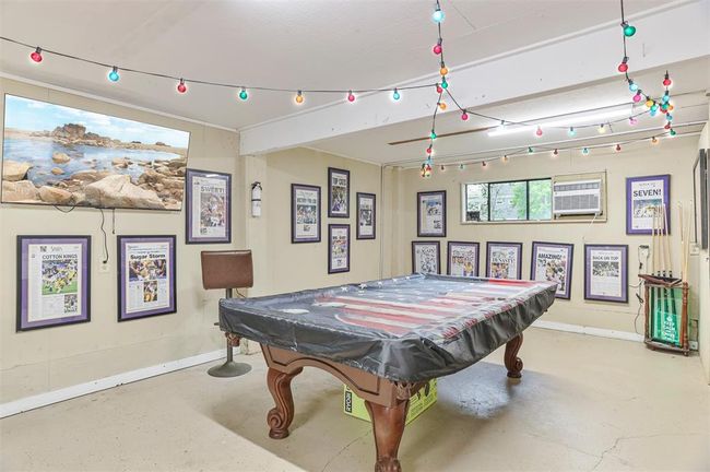 Garage area under the home is perfect for your pool table | Image 6