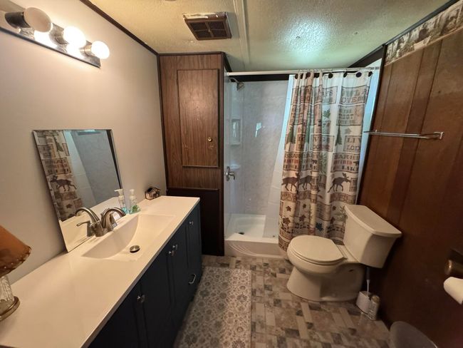 Remodeled Bathroom with walk in shower | Image 22