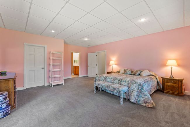 Lower level guest bedroom w/ ensuite 3/4 bath | Image 34