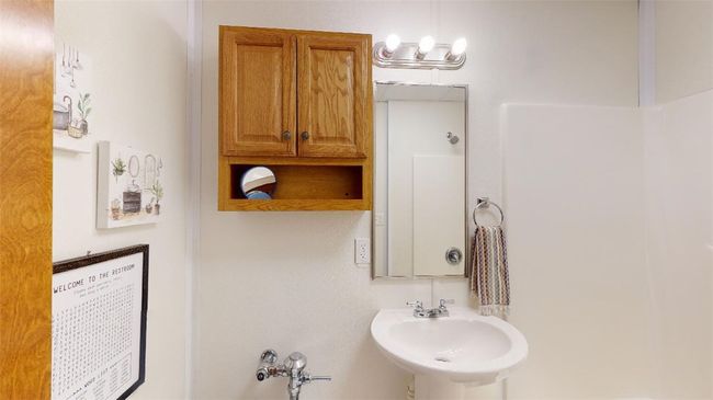 Bathroom featuring a sink | Image 11