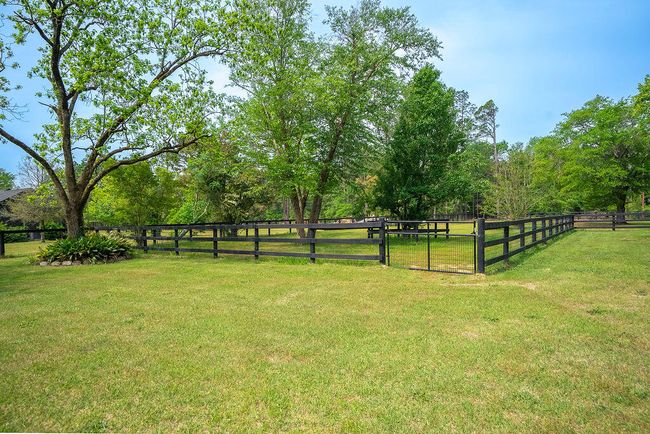 The front pasture wraps around the side and to the front of the property. | Image 52