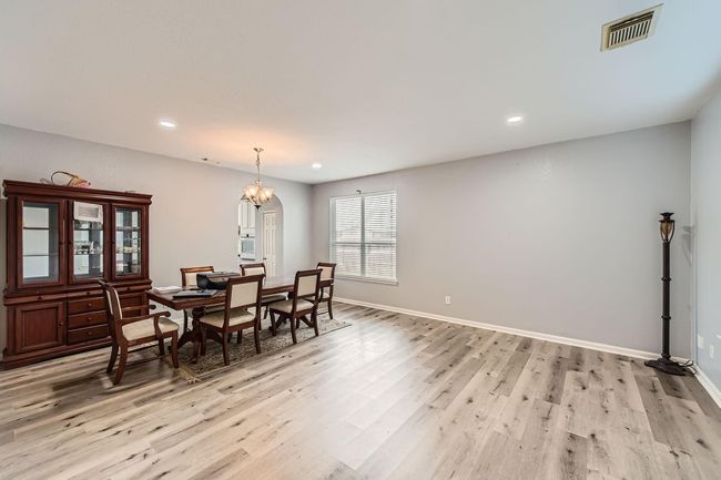 Welcoming formal dining room just off the front entrance. | Image 9