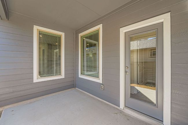 Doorway to property with a patio area | Image 24