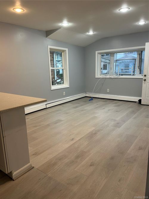1-139-11 87th Dr, Jamaica, NY, 11435-3009 | Card Image