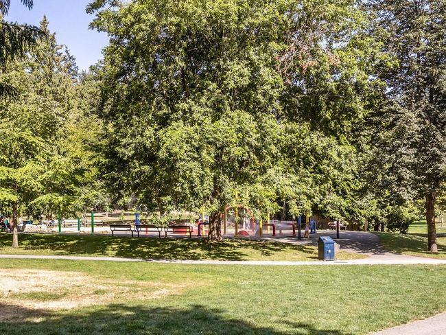 View of property's community featuring a lawn | Image 23