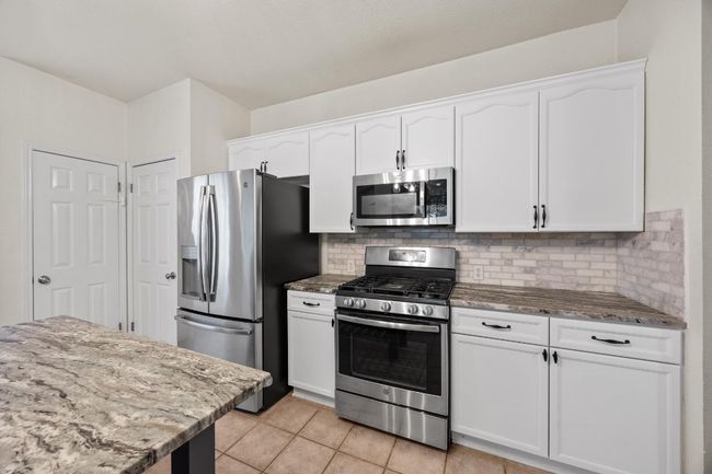 Comes with stainless appliances including the refrigerator! | Image 11