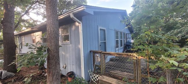 Back of the house and back porch. | Image 9