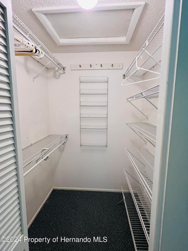 Primary walk-in closet | Image 16