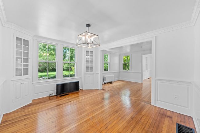 There are beautiful hardwood floors throughout the home. | Image 18