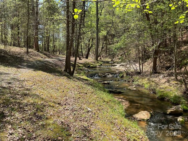 Community walking trail a short walk from subject property | Image 13