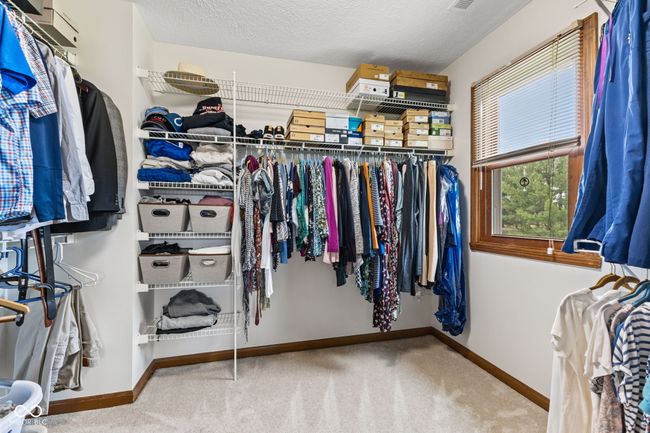 Large primary walk in closet. | Image 42