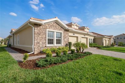 1075 Quaker Ridge Lane, Townhouse with 2 bedrooms, 2 bathrooms and null parking in Champions Gate FL | Image 1