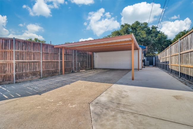 Garage featuring fence and a garage | Image 19