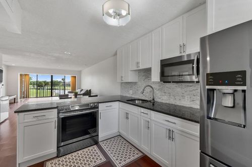 306-4489 Luxemburg Ct, Lake Worth, FL, 33467-5059 | Card Image
