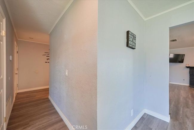 Garage door entry to the left of front door | Image 17