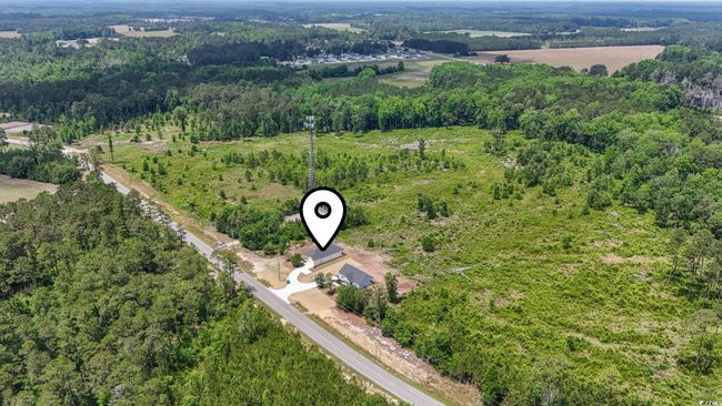 Bird's eye view of a heavily wooded area | Image 24