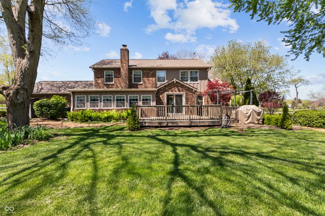 gorgeous view of the back of the home from your private backyard. | Image 44