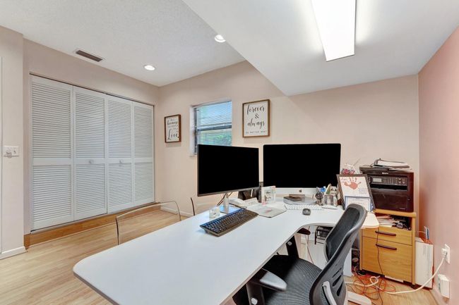View of window and closet in A/C office space 1/2 of garage. Only dry wall - easy demolition. | Image 25