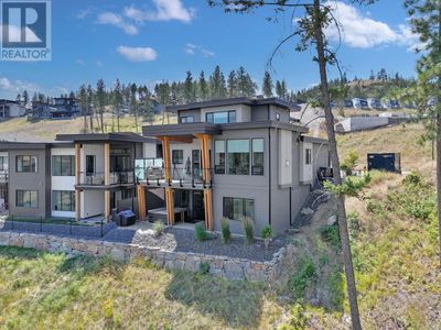 1888 Northern Flicker Crt, House other with 4 bedrooms, 4 bathrooms and 2 parking in Kelowna BC | Image 2