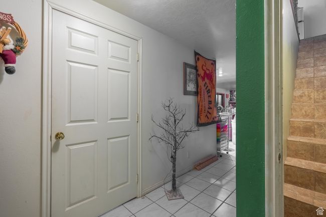Hall featuring light tile patterned flooring | Image 44