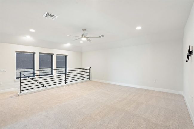 Carpeted spare room with a ceiling fan and recessed lighting | Image 27