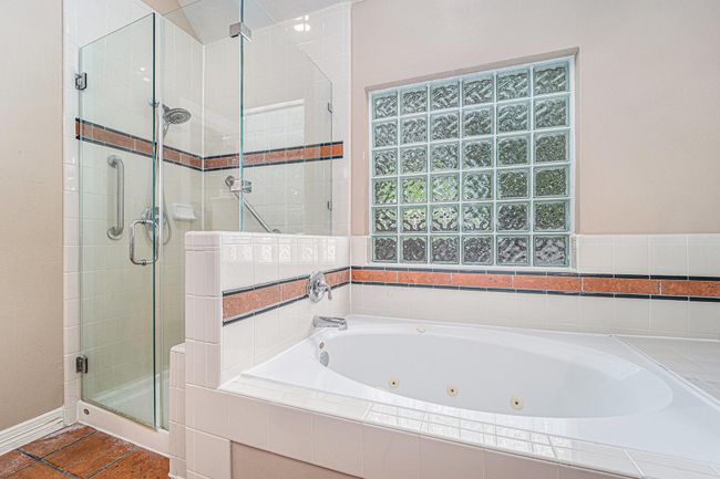 Closer look at this relaxing soaking tub and shower. | Image 25