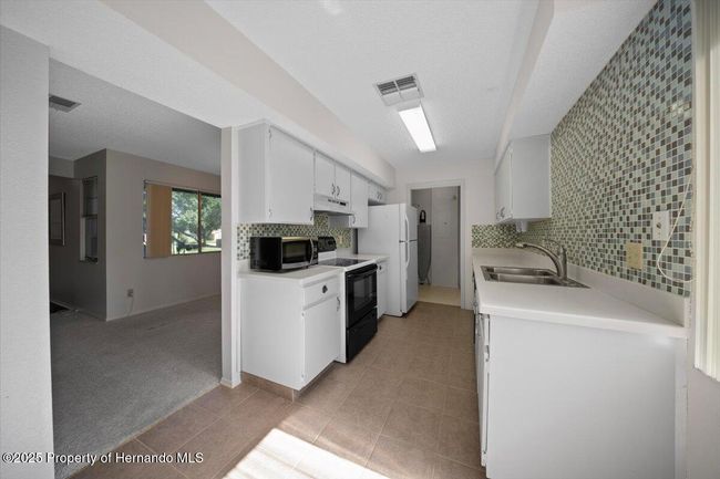 7682 St Andrews Blvd, Condo with 2 bedrooms, 2 bathrooms and null parking in WEEKI WACHEE FL | Image 11