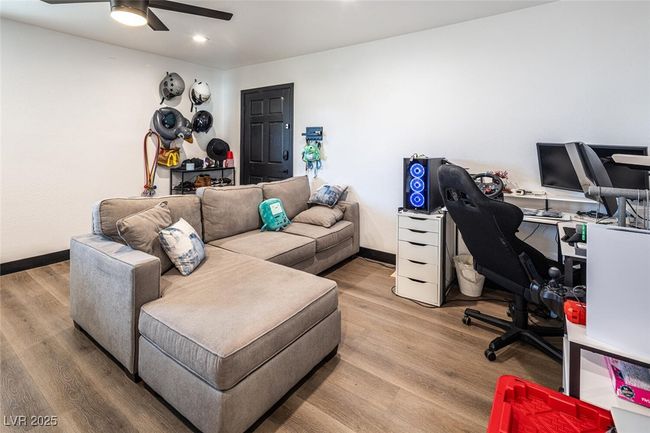Office with recessed lighting, baseboards, wood finished floors, and a ceiling fan | Image 27