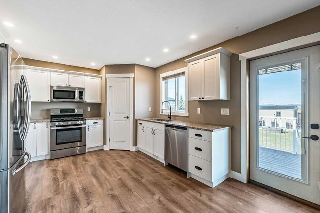 2001 31 Avenue, Home with 4 bedrooms, 2 bathrooms and 2 parking in Nanton AB | Image 9