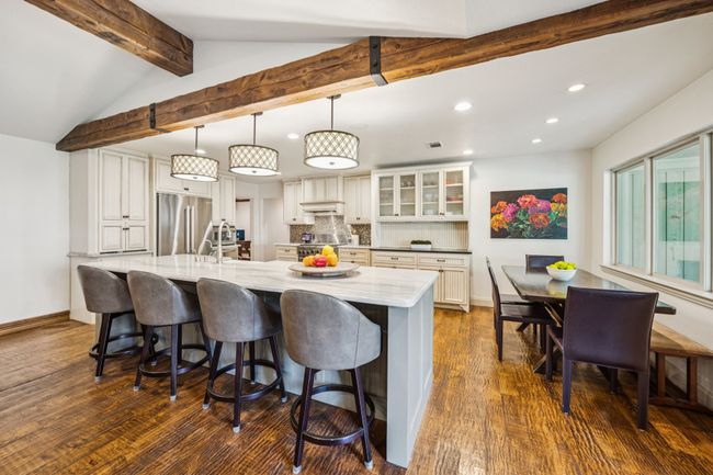 Spacious kitchen with large island and breakfast nook - great for entertaining! | Image 4
