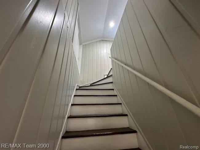 Stairs featuring ornamental molding | Image 21