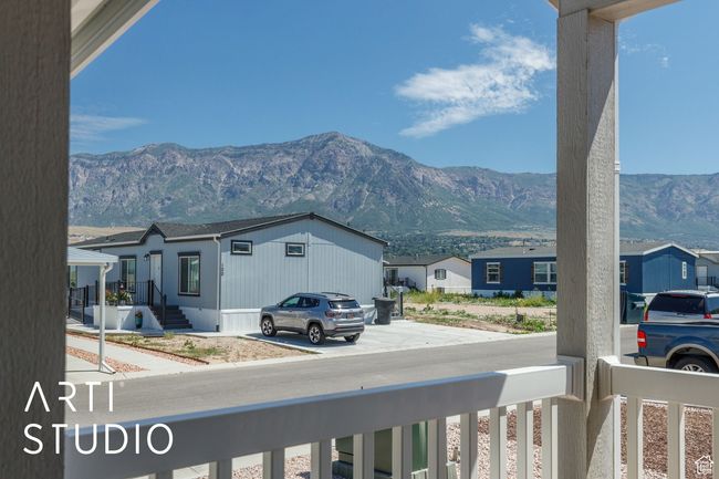 Mountain view featuring nearby suburban area | Image 6