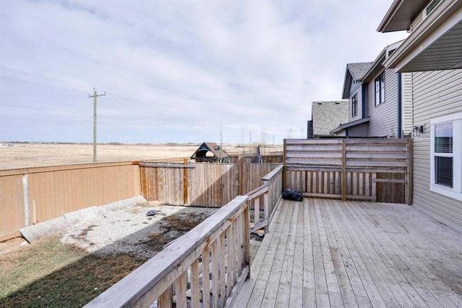 202 Reunion Green Nw, Home with 6 bedrooms, 3 bathrooms and 4 parking in Airdrie AB | Image 8