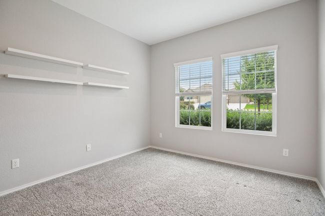 Bedroom 2 at the front of the home. | Image 19
