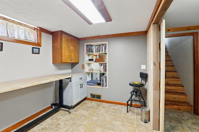 Lower level flex room with sliding barn doors | Image 23