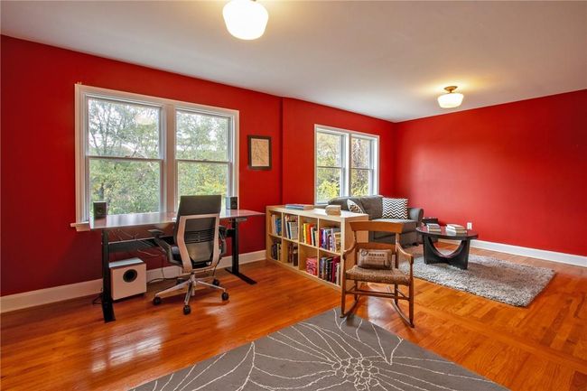 Office space featuring hardwood / wood-style floors | Image 13