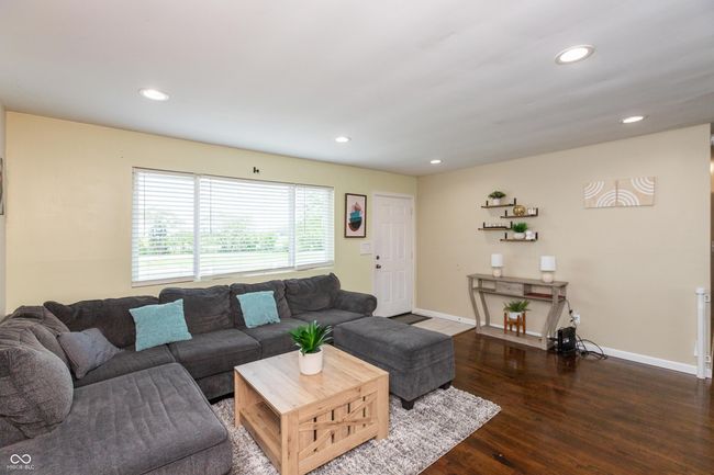 living area featuring wood finished floors and recessed lighting | Image 5