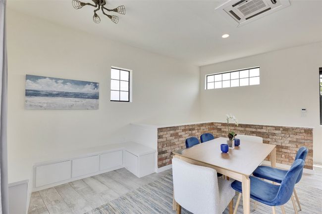 Dining room featuring plenty of natural light, recessed lighting, and light wood finished floors | Image 26
