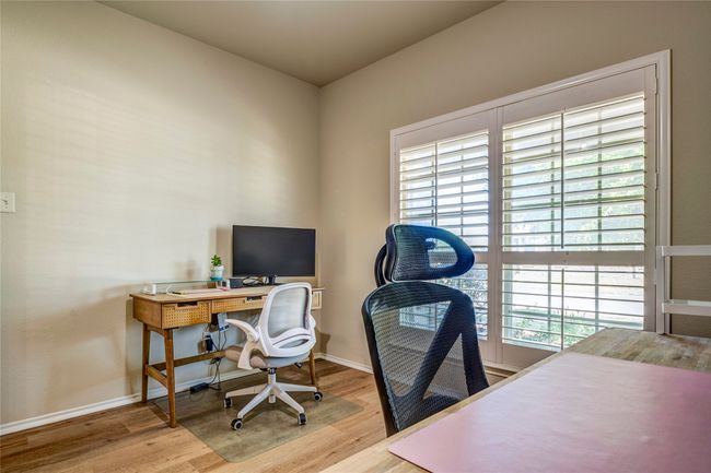 Office space with baseboards and wood finished floors | Image 7