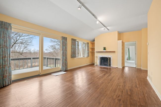 Dining Room/Den with fireplace. | Image 9