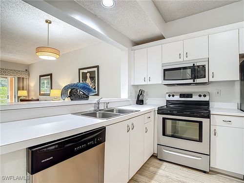 apt-b102-1044 Woodshire Ln, NAPLES, FL, 34105-7433 | Card Image