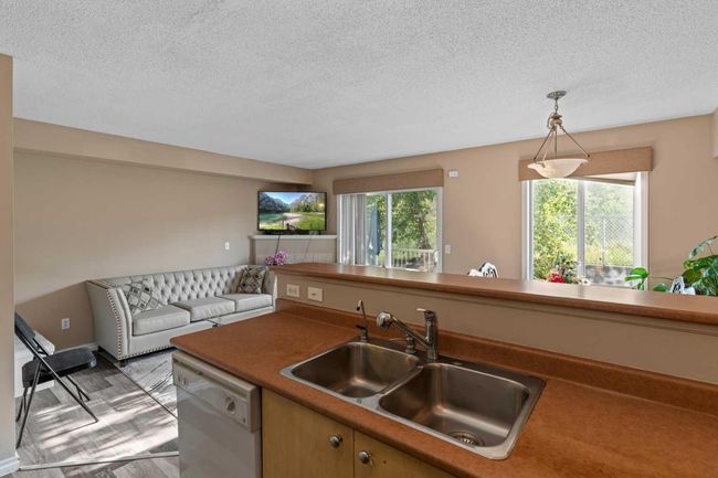 64 Citadel Meadow Gdns Nw, Townhouse with 3 bedrooms, 3 bathrooms and 2 parking in Calgary AB | Image 6